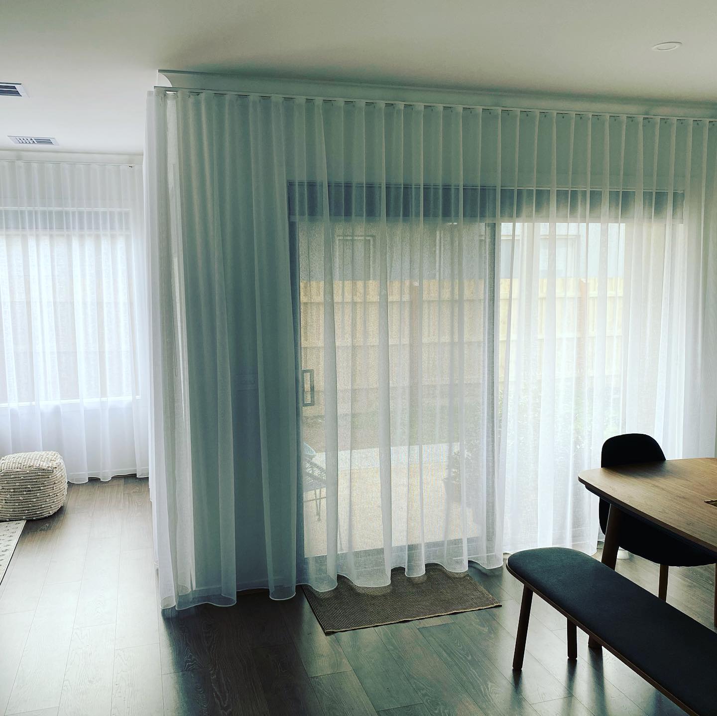 colour sheer curtains installed in Aintree